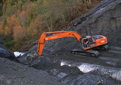 New culvert is placed in roadbed