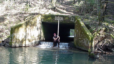 Box culvert with jump prevents migration of fish and cannot accomodate large storm flows