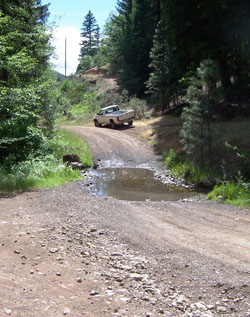 View of the Summit Creek crossing during summer-low water conditions